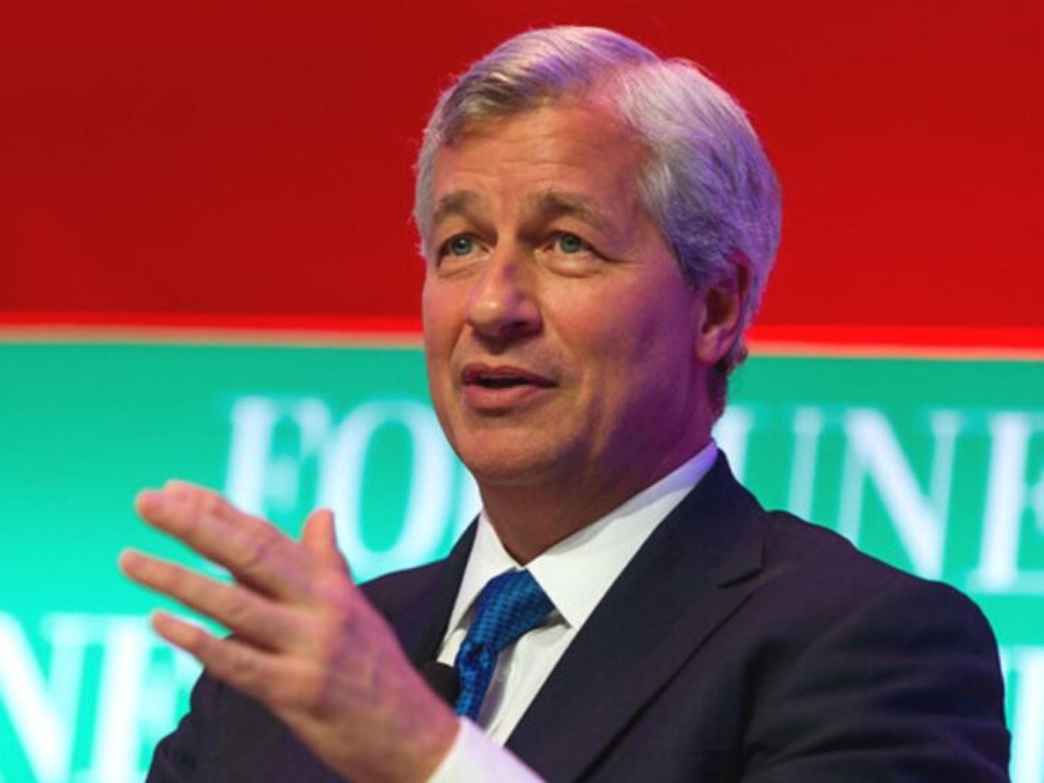  jpmorgan-ceo-jamie-dimon-said-hed-fire-in-a-second-anyone-caught-trading-bitcoin-when-it-was-at-4000-7-years-later-the-investment-bank-holds-positions-in-spot-etfs-tracking-the-apex-crypto 