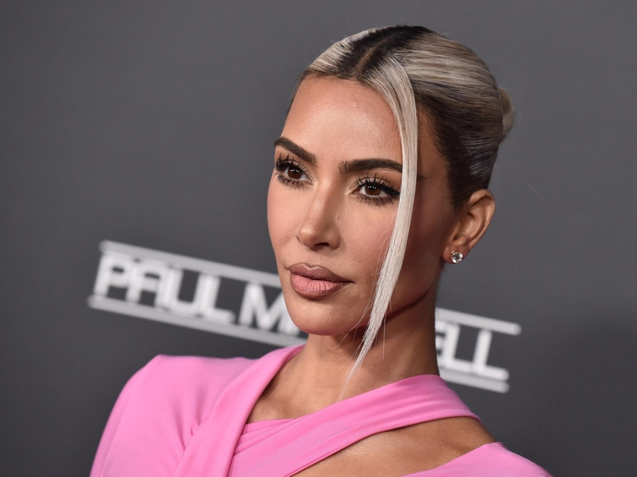  kim-kardashian-debuts-custom-metallic-silver-cybertruck-will-elon-musk-approve-the-celebrity-makeover 