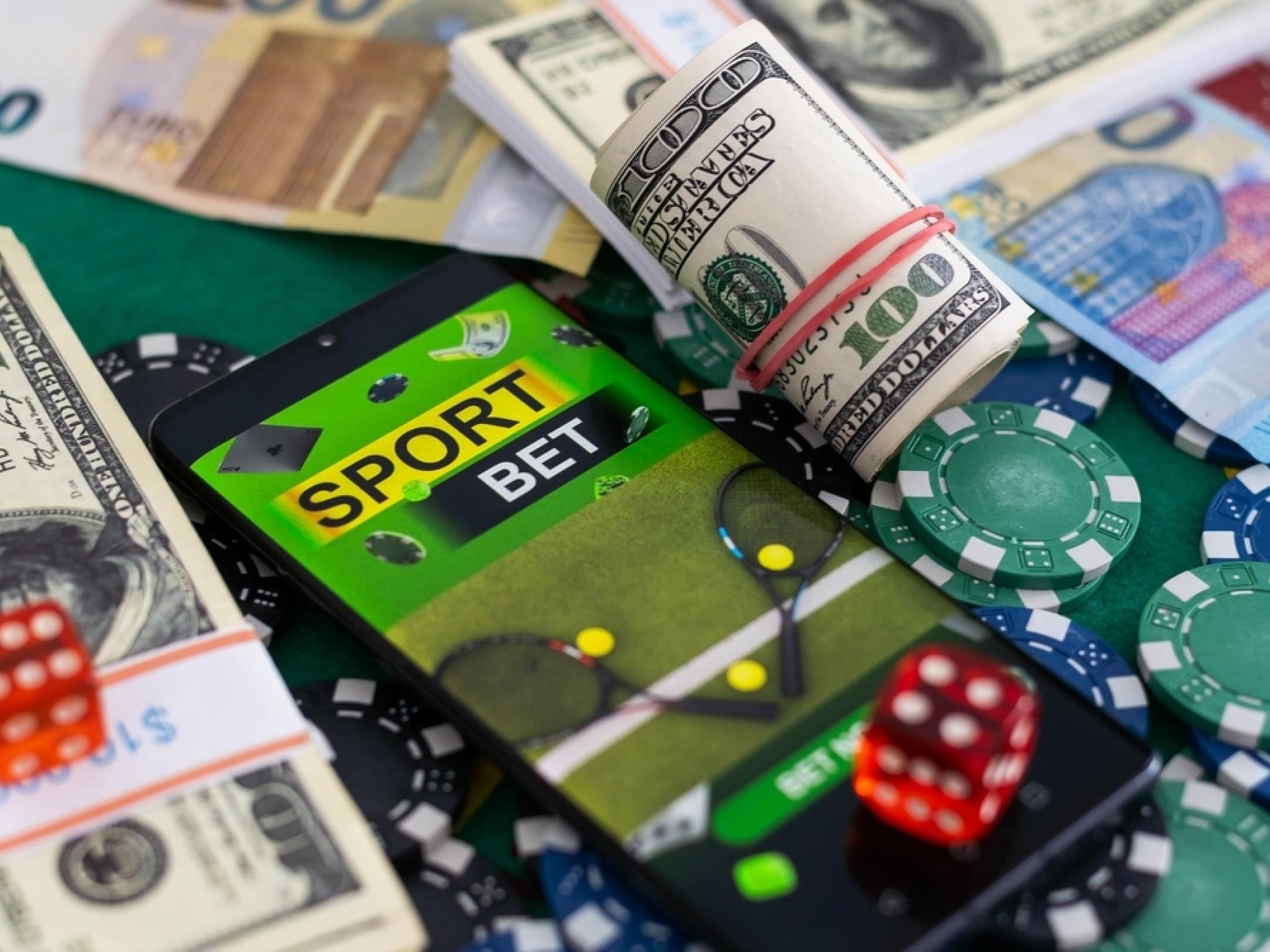  draftkings-flutter-stocks-downgraded-on-prediction-market-risk-relentless-headwinds 