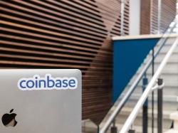  cathie-wood-trims-tesla-stake-and-loads-up-heavily-on-coinbase 