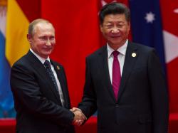  as-vladimir-putin-meets-xi-jinping-russia-may-consider-issuing-yuan-denominated-government-bonds 