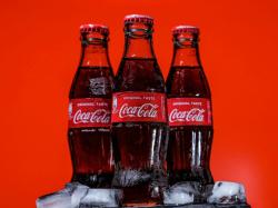  gold-moves-higher-coca-cola-increases-fy24-forecast 