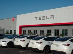  tesla-showroom-fire-destroys-24-vehicles-in-france--authorities-suspect-arson-report 