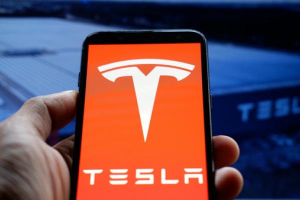 What is driving Tesla stock down for the third straight session on Wednesday