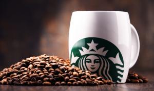 Starbucks coffee cup and beans.