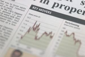 Section,Of,A,Financial,Newspaper,Titled,Key,Movers