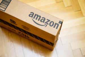 Amazon cardboard box on wooden floor