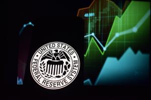Fed Reservew logo on stock market background