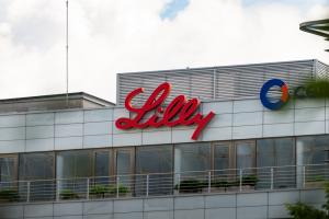 Close-up of the Eli Lilly signage on an office building exterior in Europe.