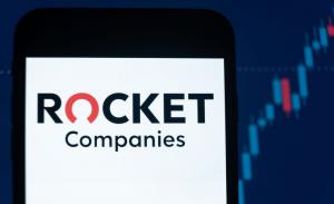 Rocket Companies logo on smartphone stock chart background