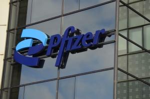 Pfizer logo on glass building facade