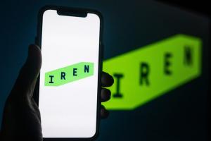 IREN logo on smarthone with IREN logo on a screen behind it