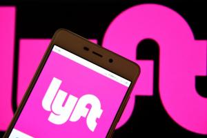 Lyft logo on smartphone screen.