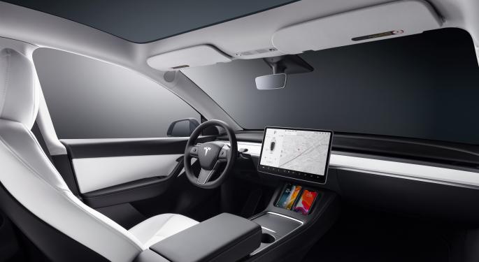 Why This Investor Plans To Hold Tesla Stock Through Earnings Next Week