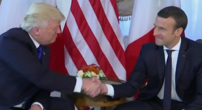 Grip-And-Grimace Rematch? Trump Heads To Paris To Meet With Macron