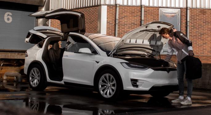 Tesla Finally Confirms Stock Split Amid Plunge, Nio Unveils Plans For 2024, Fisker's Orders Overflow: Week's Top News From EV Industry
