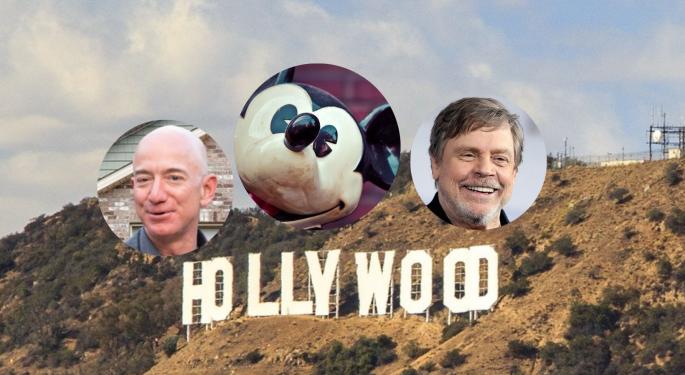 Benzinga Buzz: Will Bezos Buy AMC? Could Disney Acquire Apple? Joker Helps Ukraine?