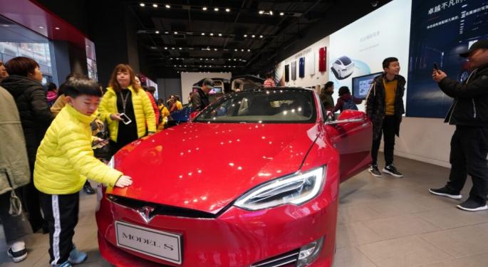 If You Had Invested $1000 In Tesla Stock When EV Giant Entered China Exactly 10 Years Ago, Here's How Much You'd Have Now