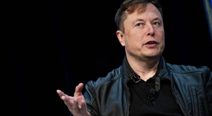 Tesla CEO Elon Musk Is Impressed By The Fact That Jeff Bezos' AWS 12-Month Revenue Is Higher Than 466 S&P 500 Companies: 'Wow'