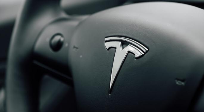 Artist Sends Message To Elon Musk: 'Look What I Do To Your Lousy Car,' Crushes Tesla With 9 Tons Of Stone