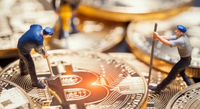 Bitcoin's Record Rally To $73K Overshadows Death Cross Signals In Two Crypto Mining Stocks