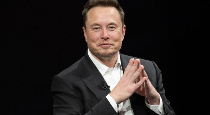 Elon Musk Calls Trump Trade Advisor Peter Navarro 'Dumber Than Sack Of Bricks,' Defends Tesla As 'Most American-Made Cars'