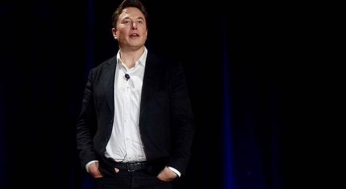 Tesla Vs. Apple EV Battle Heats Up: Elon Musk Says Tim Cook Refused To Meet During Model 3's 'Darkest Days'