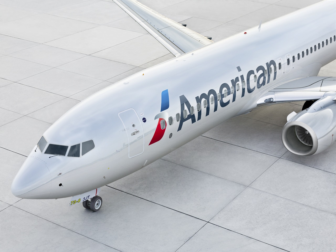 American Airlines' Q4 Bottom-Line Beats Street View; Prioritizes Profitability & Debt Reduction
