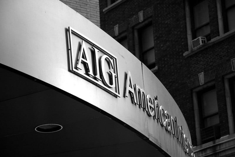 AIG Terminates Interim Finance Chief Mark Lyons After Violating Obligations