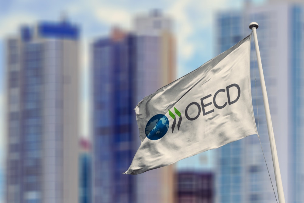 OECD Details Final Guidance To Implement New Global Minimum Corporate Tax: Expects Additional $220B Income