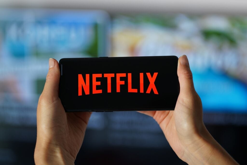 Netflix And Other Streaming Stocks Slide As Trump's Proposed Tariffs On Foreign Films Sparks Concern - Benzinga (Picture 1)