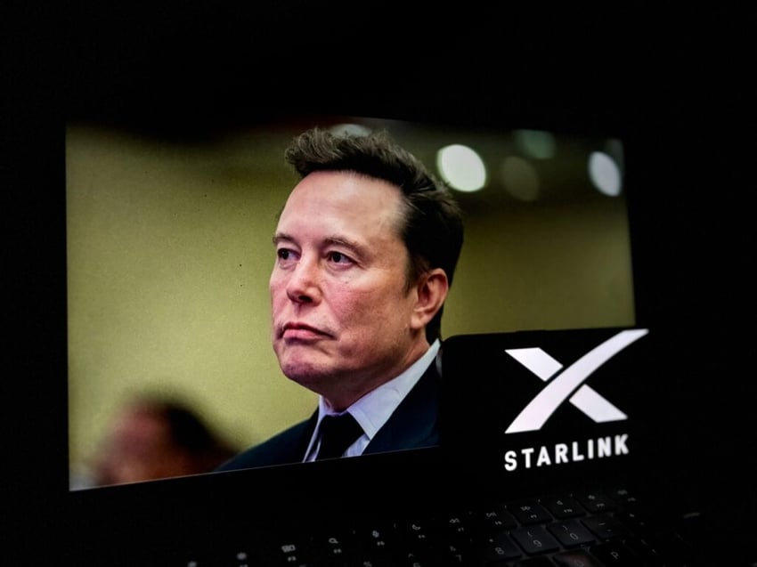 Elon Musk with Starlink logo on front