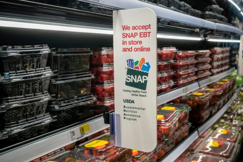New York NY USA-October 8, 2024 A sign in a store in New York announces that the store accepts SNAP (Supplemental Nutrition Assistance Program) formerly known as EBT