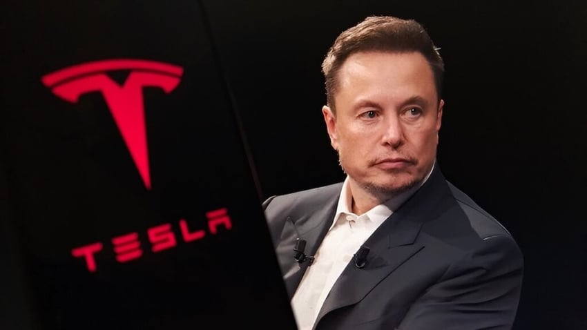Focused shot capturing Elon Musk alongside the Tesla logo, symbolizing innovation, technology, and entrepreneurship. Ideal for business, tech, and leadership content. Taken on 10 July 2025