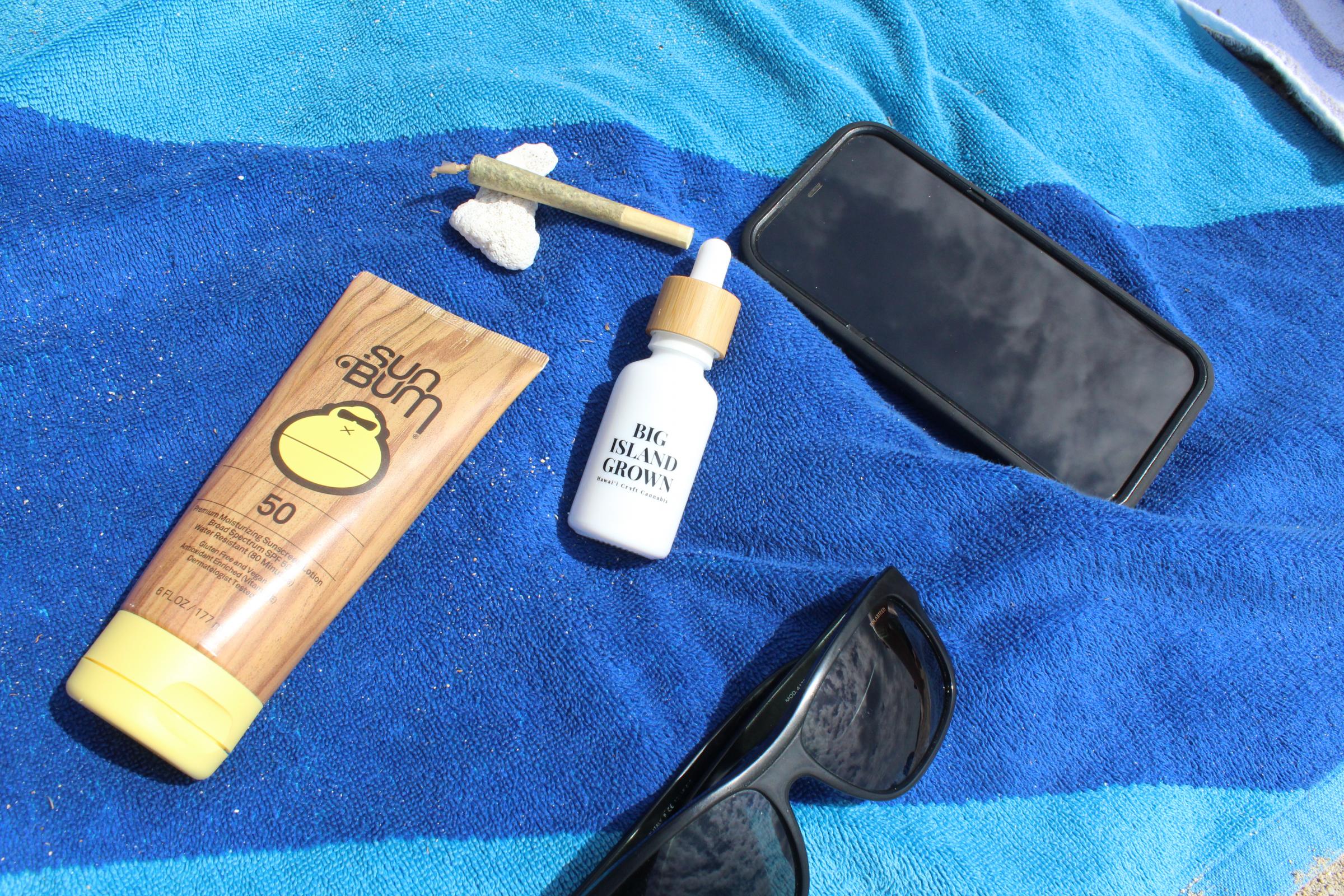 big_island_grown_cbd_tincture_and_joint_lifestyle.jpg